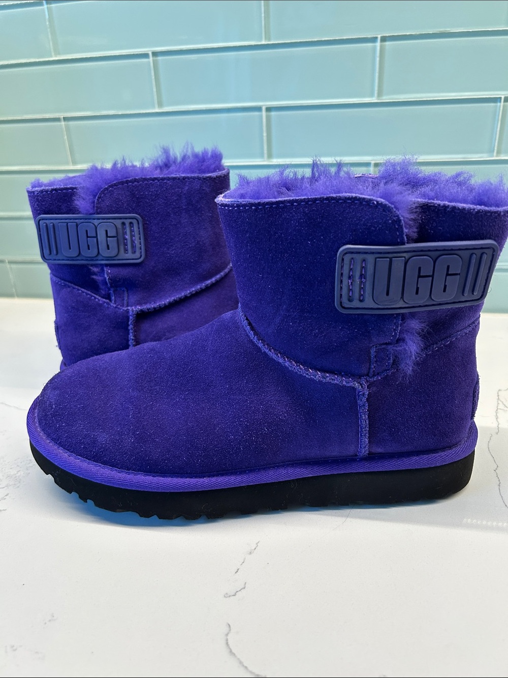 UGG Mini Bailey Logo Strap Velcro Purple boots. Size 6. Never Worn!